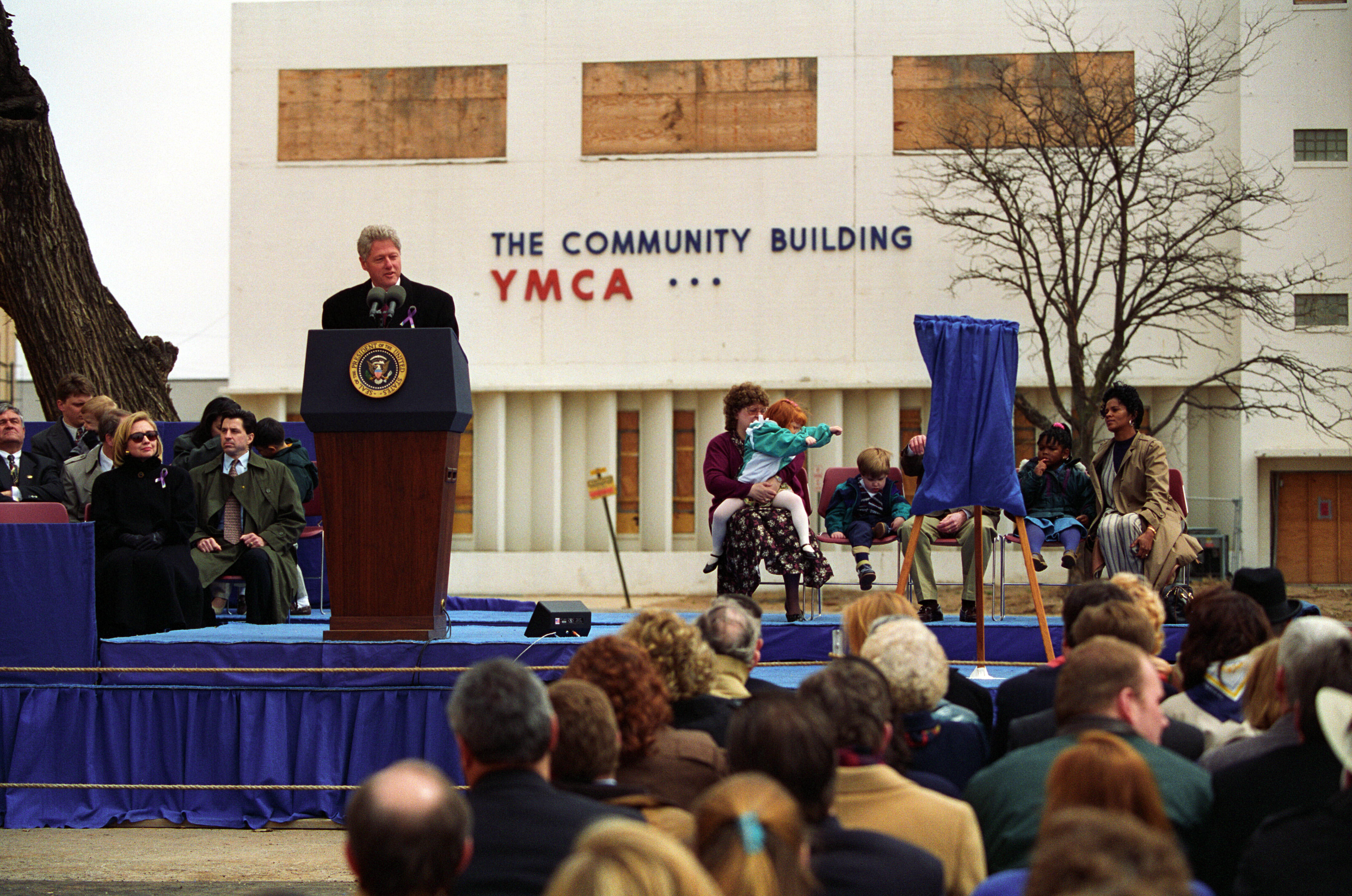 President Clinton and First Lady Hillary Rodham Clinton participate in a plaque dedication for the new YMCA Child Care Center in Oklahoma City