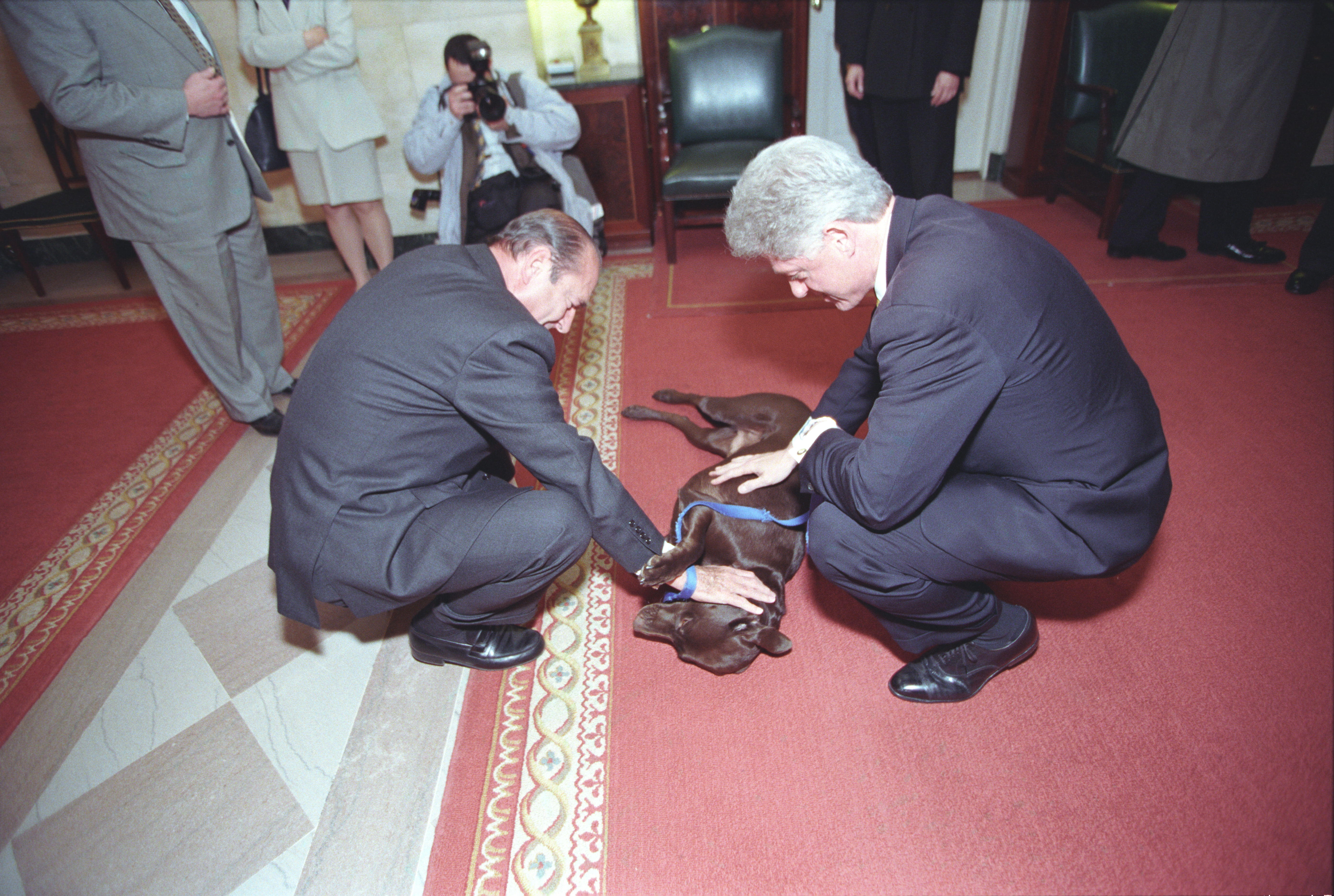 President Clinton & President of France, Jacques Chirac, pet Buddy the Dog in the White House