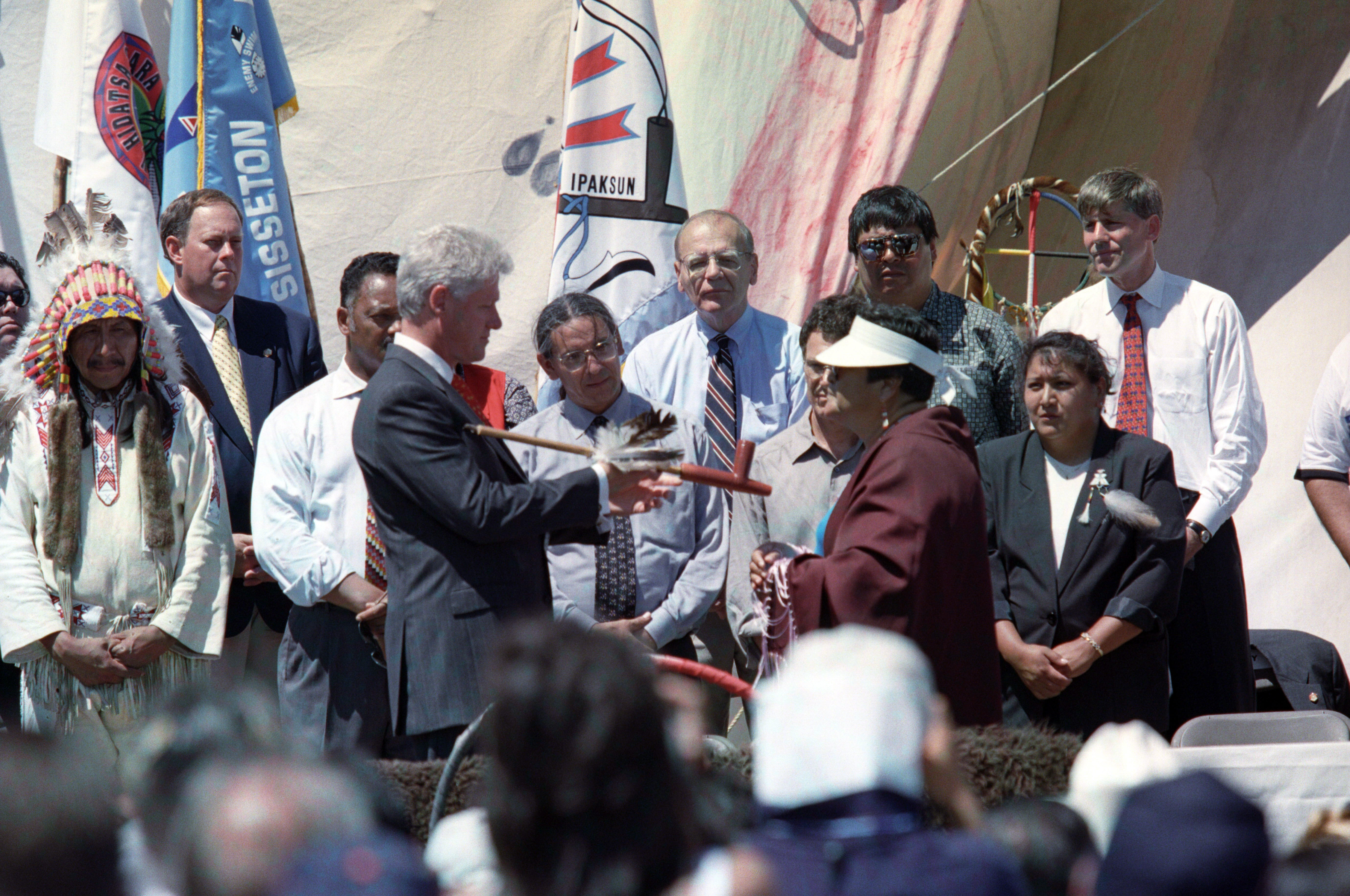 Millie Horn Cloud performs a traditional pipe ceremony with President Clinton at the Pine Ridge Reservation in South Dakota on July 7, 1999