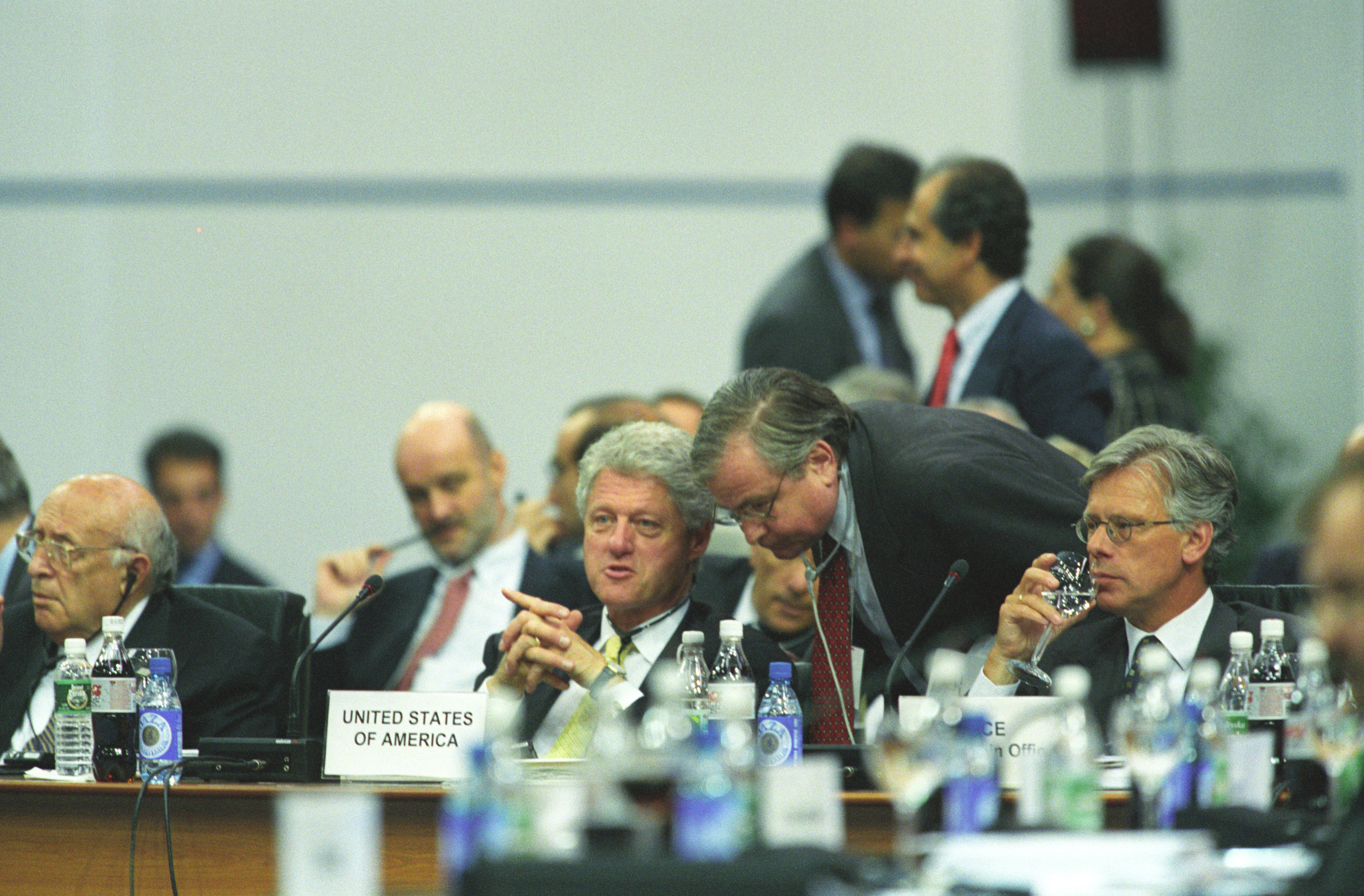 President Clinton confers with National Security Advisor, Sandy Berger at the Stability Pact Summit, Sarajevo, Bosnia-Herzegovina