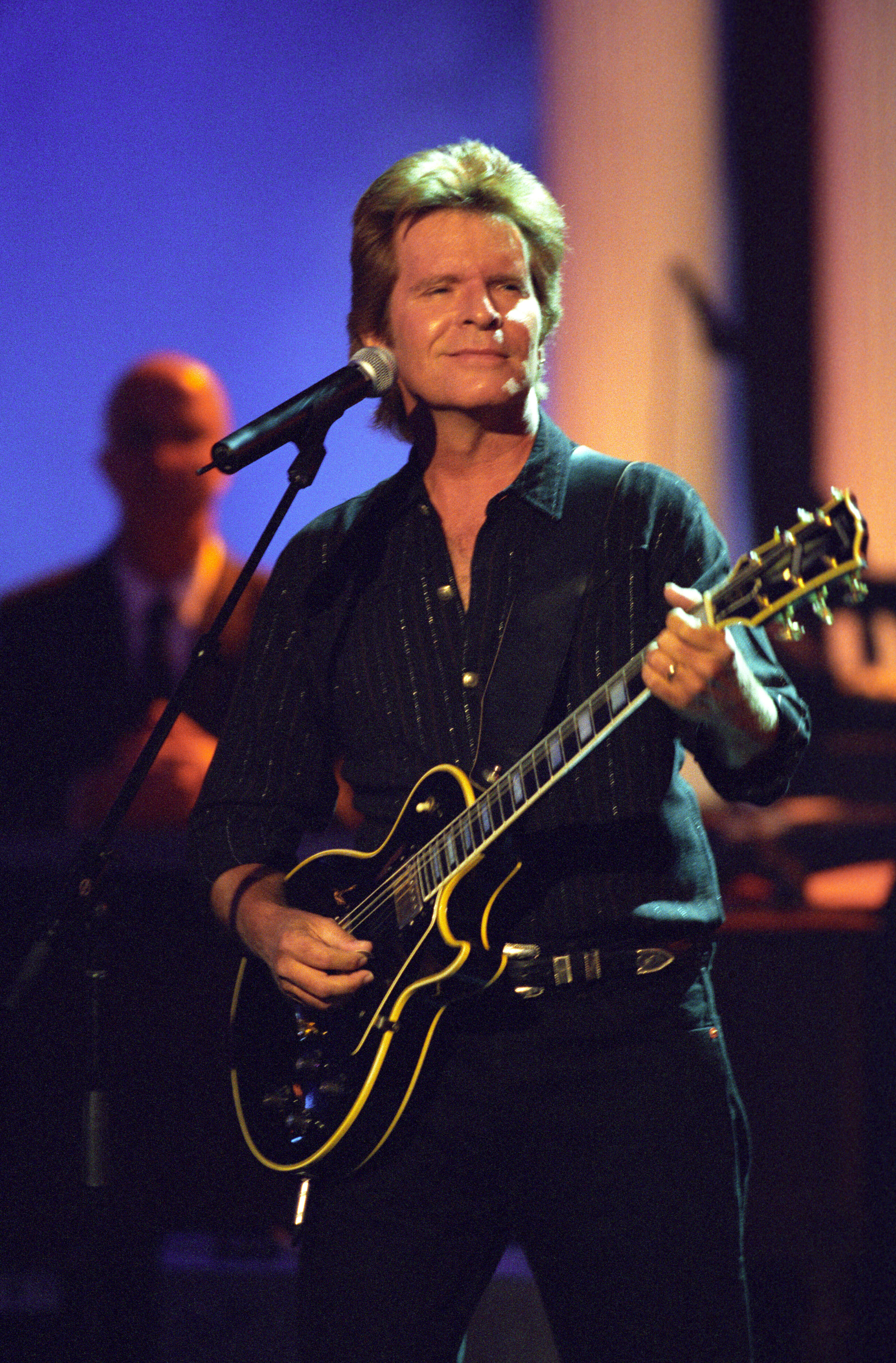 Rock n' Roll Hall of Fame Musician John Fogerty performs at the VH1 Save the Music "Concert of the Century" at the White House