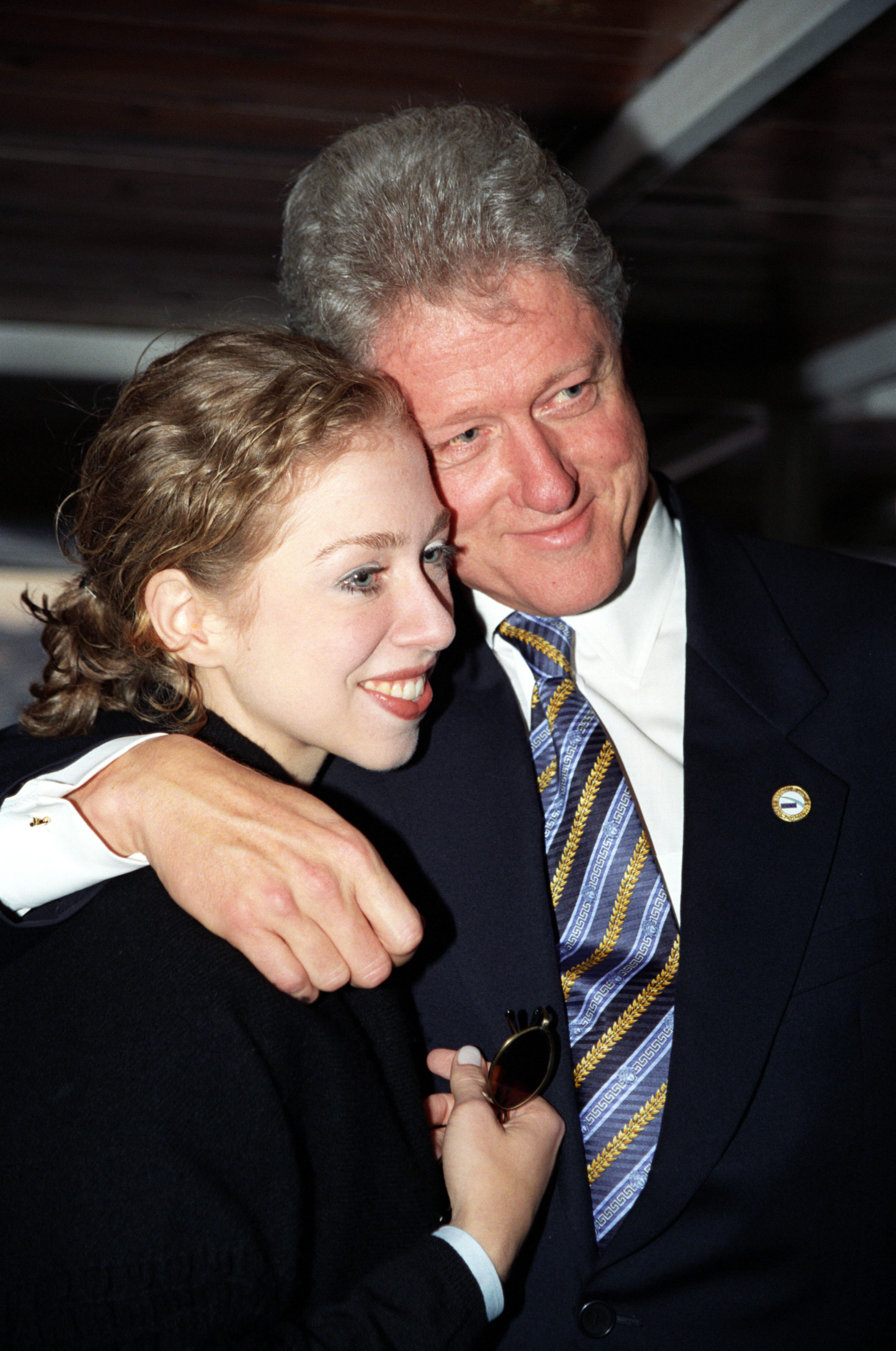 President Clinton with his arm around his daughter, Chelsea Clinton while they take a boat cruise on the Bosphorus River in Istanbul, Turkey