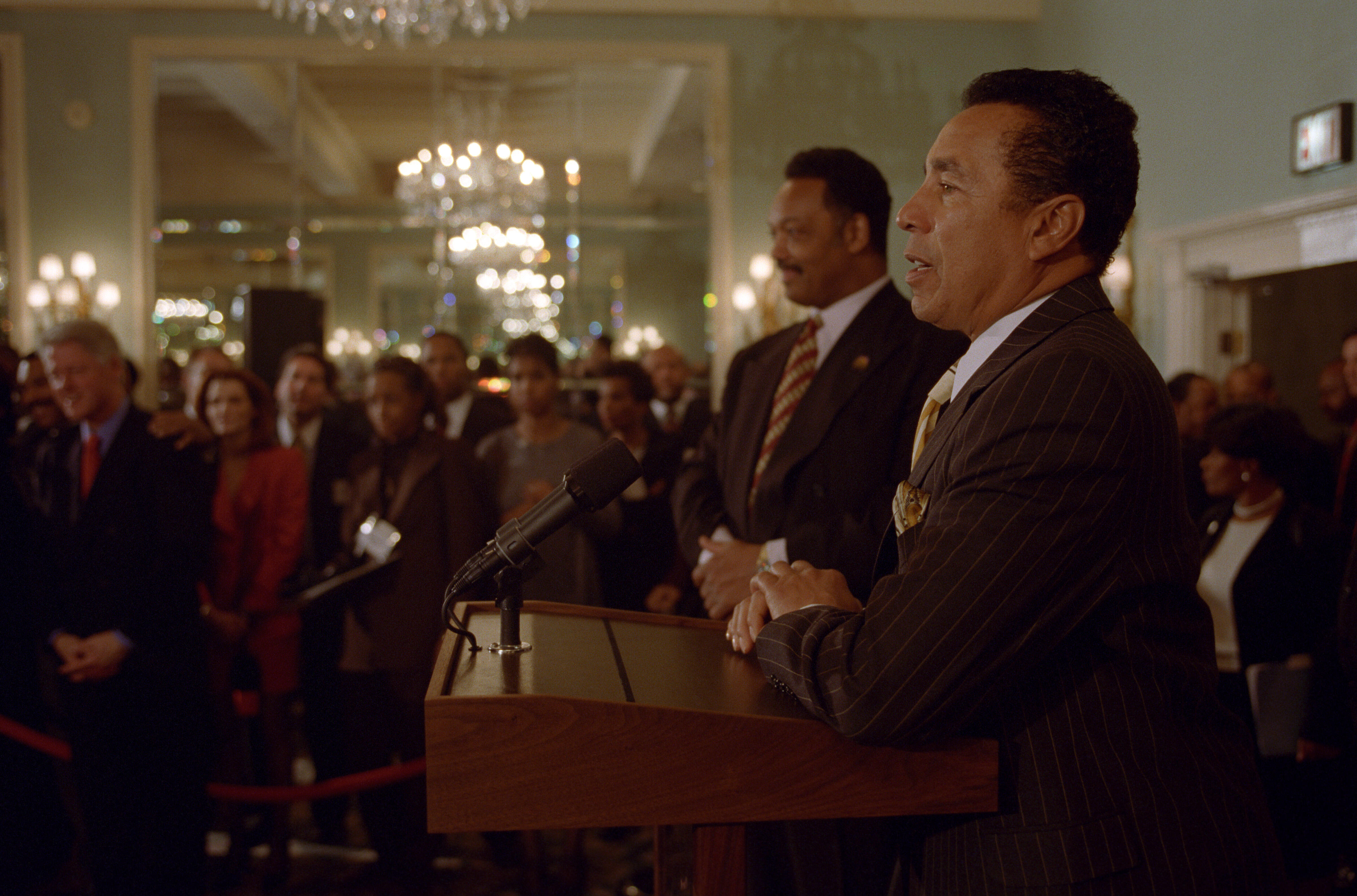 President Clinton, Jesse Jackson, and musician Smokey Robinson address the "Keep Hope Alive" reception at the Hotel Washington in Washington, DC