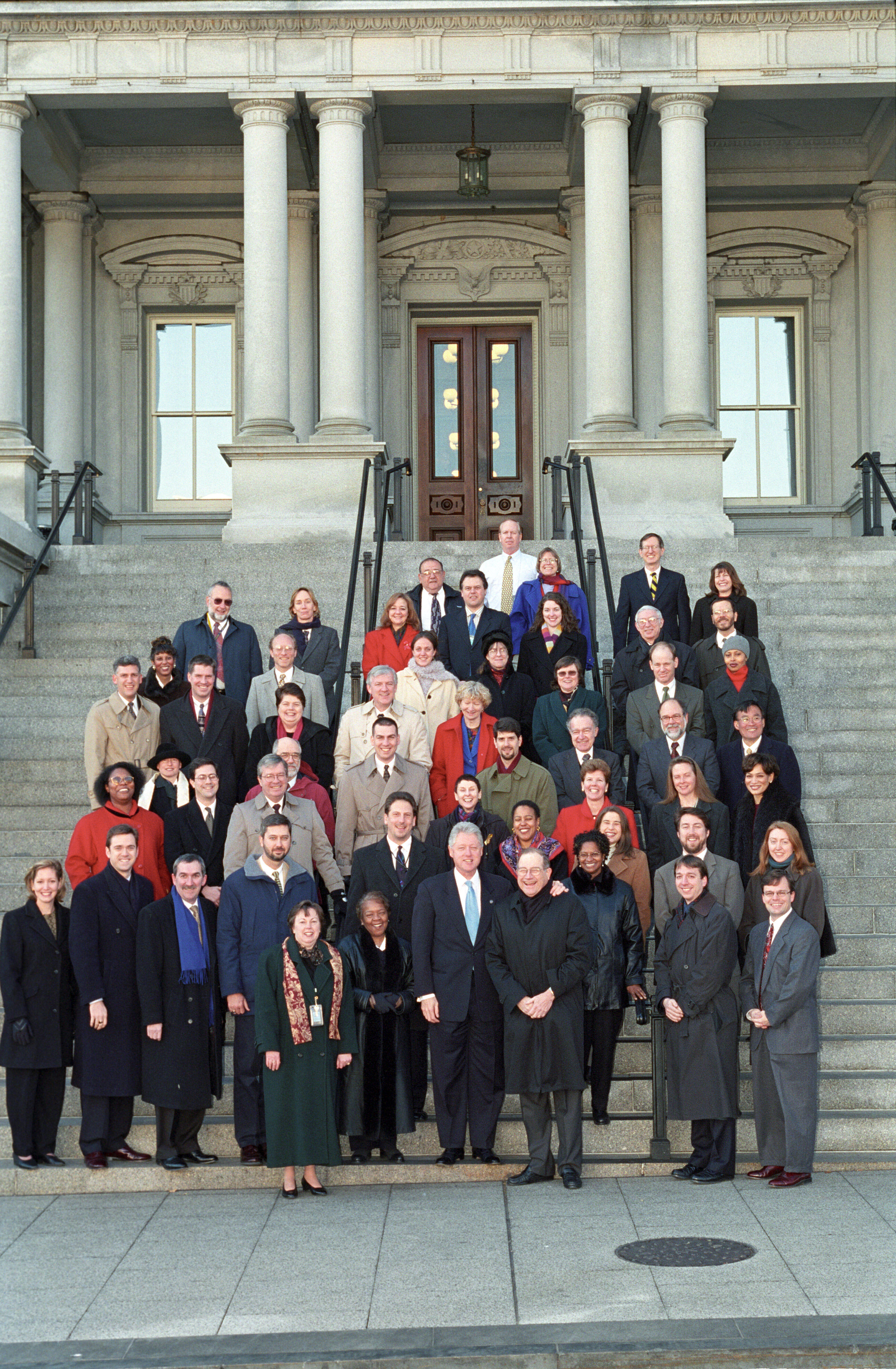 President Clinton joins Neal Lane and the staff of the Office of Science and Technology for a group photo outside on the steps of the Eisenhower Executive Office Building (EEOB)