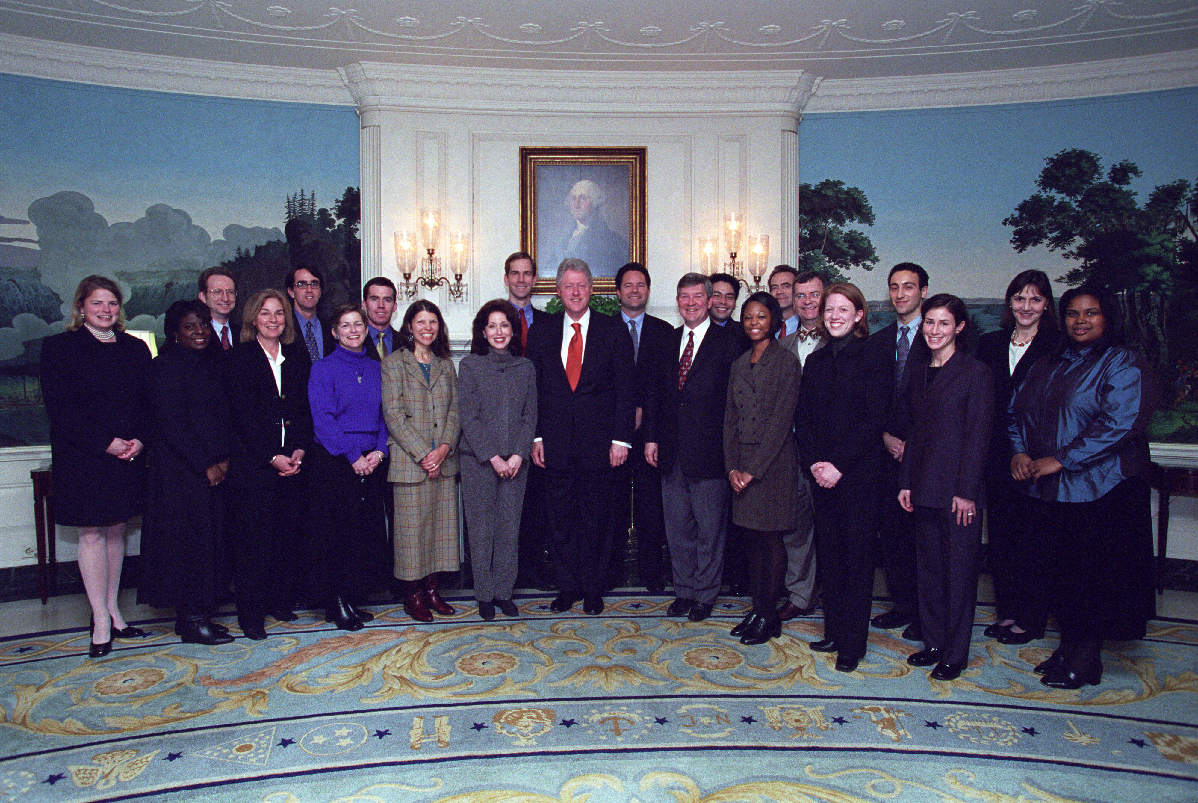 President Clinton joins the staff of the Council on Environmental Quality for a group photograph in the Diplomatic Reception Room