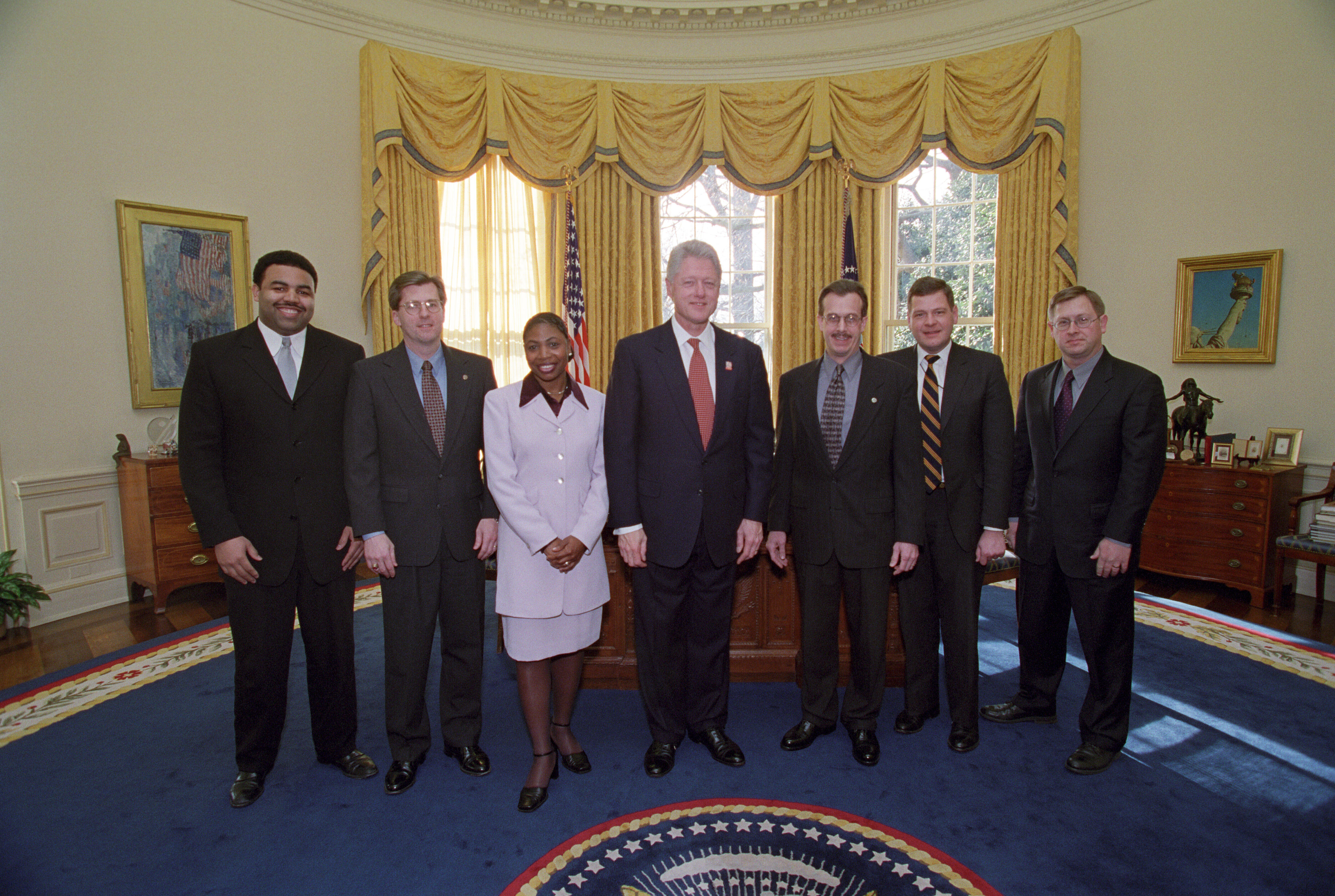 President Clinton joins the staff of the Clerk's Office for a group photo in the Oval Office